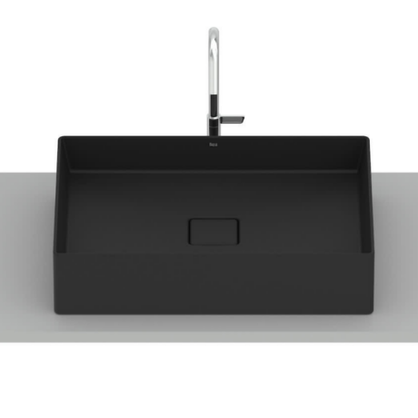 Rectangular black kitchen sink with a tall chrome faucet mounted on a light gray counter.