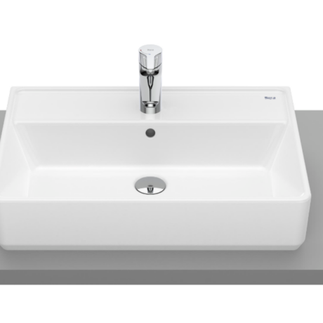 White rectangular bathroom sink with a chrome faucet on a gray countertop.