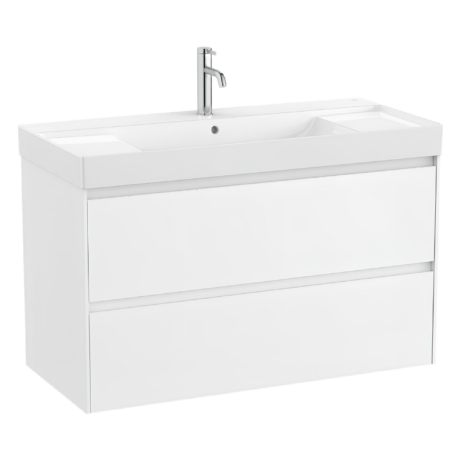 White bathroom vanity with integrated sink and chrome faucet on a white countertop
