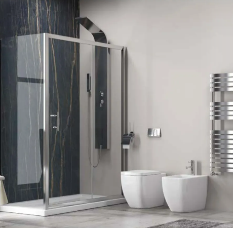 Modern bathroom with a glass-enclosed shower, black marble walls, a heated towel rack, and a white toilet and bidet.