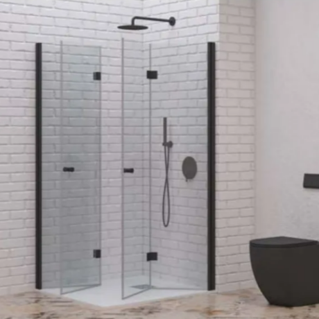 Modern bathroom featuring a glass corner shower with black frame, rainfall head, handheld shower, and a nearby black wall-mounted toilet.