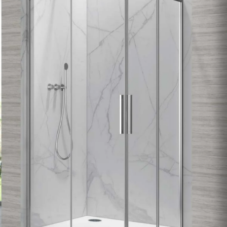 Glass-framed corner shower with marble-pattern panels, sliding doors, chrome hardware, and a handheld shower.