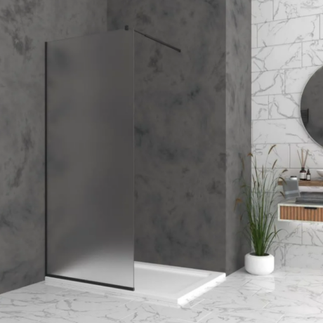 Modern bathroom with a frosted metal shower screen, marble walls, and a marble floor tile.
