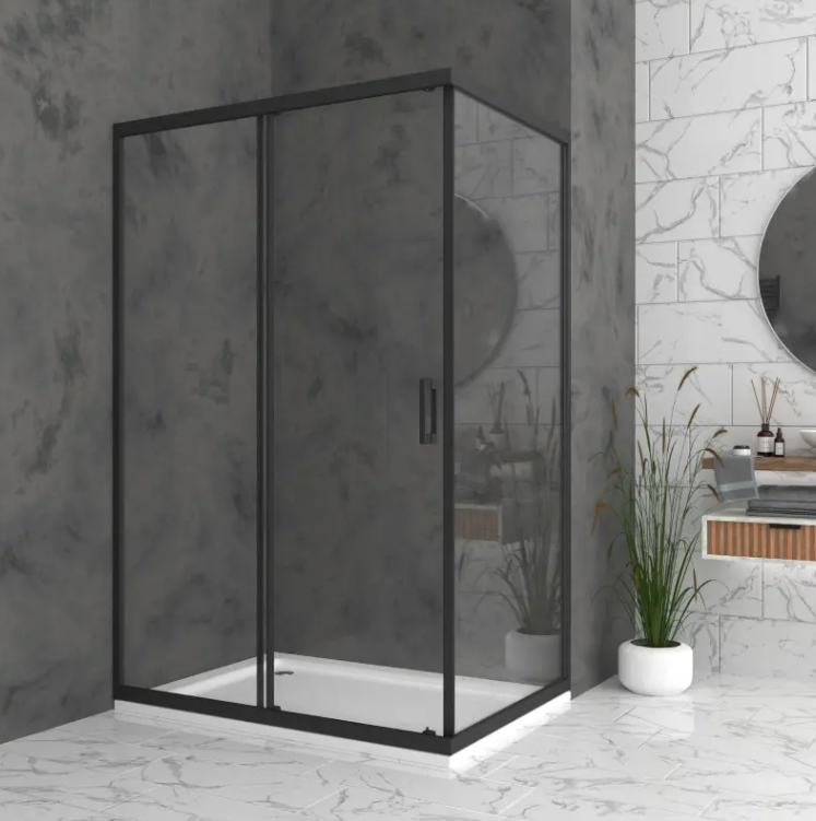 Black-framed glass shower enclosure with sliding doors in a marble bathroom.