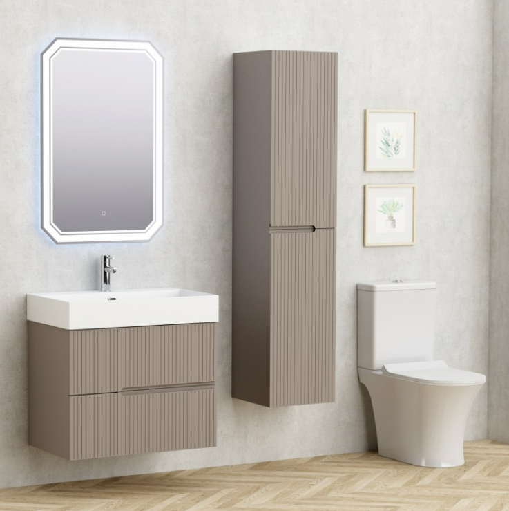 Екранна снимка 2026-08-03 201243 - Мебели за баня и душкабини Modern bathroom with a wall-mounted vanity, tall storage cabinet, and a near-white toilet beside framed botanical prints on a light wall
