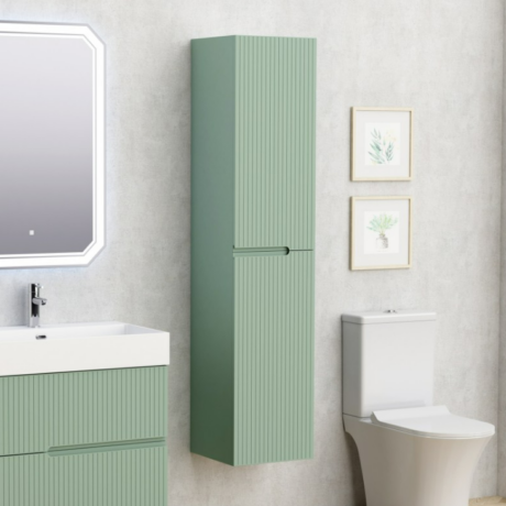 Mint green tall, ribbed storage cabinet beside a mint vanity in a modern bathroom with a white sink, mirror, and framed botanical art on the wall.