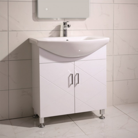 White bathroom vanity with curved sink and two-door cabinet on metal legs under a wall-mounted mirror cabinet.
