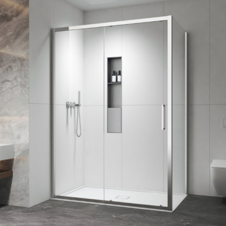 Modern bathroom shower enclosure with clear glass doors, chrome frame, and built-in niche for toiletries