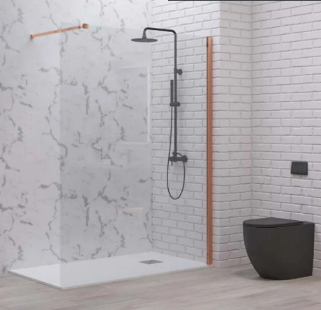 Contemporary bathroom with a glass shower enclosure, black matte shower system, marble-pattern wall on the left, white brick walls, and a black toilet.